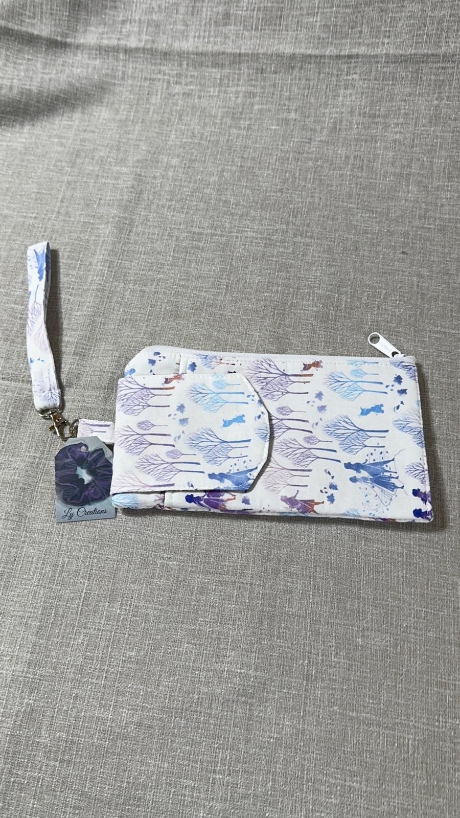 White Character Print Wristlet